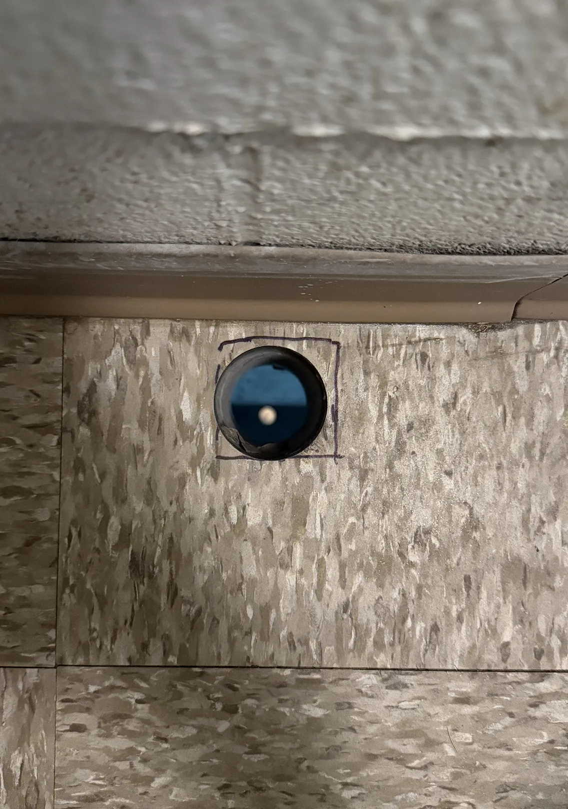 Core drilled opening through concrete