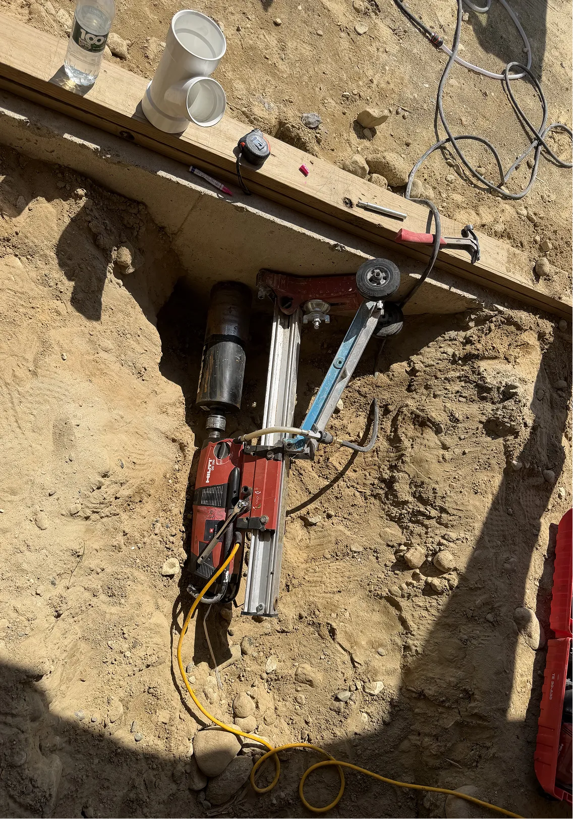Core drilling a concrete foundation wall